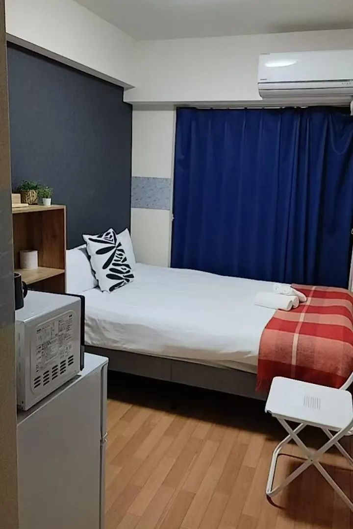 Hotel apartamentowy 天满桥 Guest House #有电梯 #步行大阪城 #赏樱花必打卡点 #直达梅田 京都 #多浴室多厕所非常适合家庭客人入住 #免费wifi Japonia